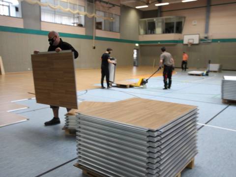 Verlegung des Schonbelages in der Stadthalle